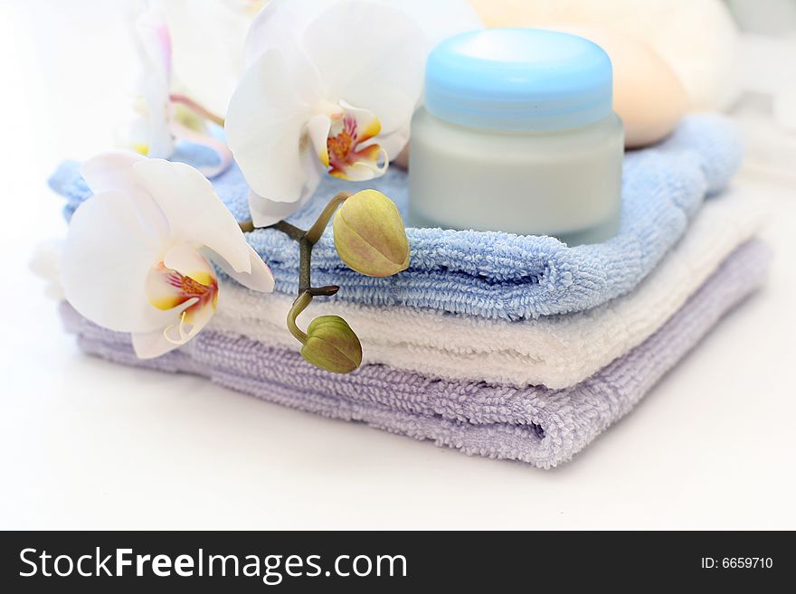 Tender SPA look with orchid in background. Tender SPA look with orchid in background