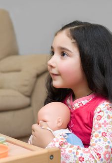 Adorable Little Girl Holding A Doll Royalty Free Stock Image Adorable Little Girl Holding A Doll Royalty Free Stock Image