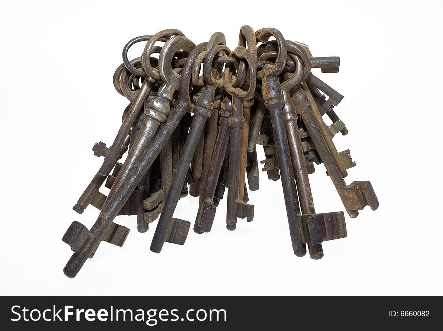 Bunch of old fashioned skeleton keys isolated on white background. Bunch of old fashioned skeleton keys isolated on white background