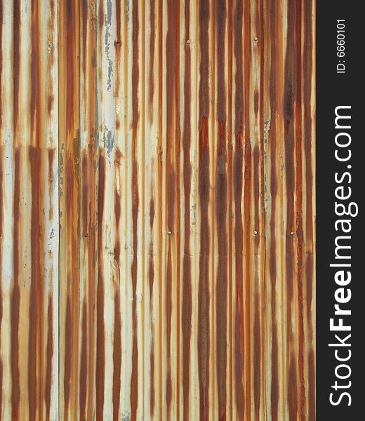 Old rusty orange metal wall background. Old rusty orange metal wall background