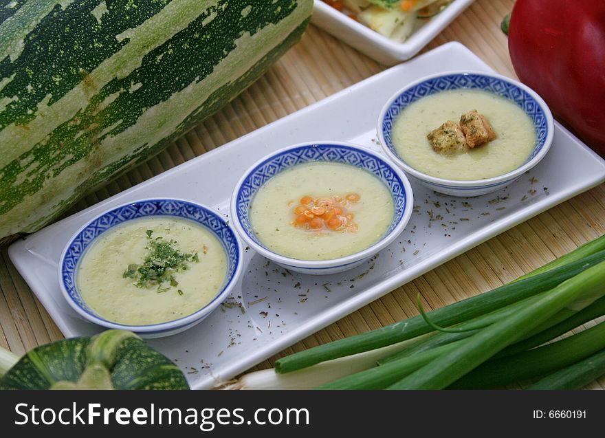 Some fresh soup of zucchinis in bowls