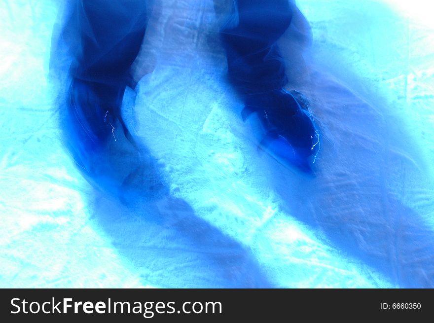 Bright and colourful motion blur of ice skates. Bright and colourful motion blur of ice skates