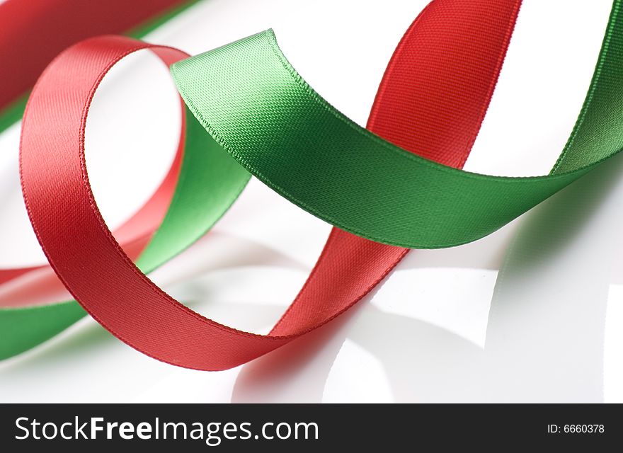 Red And Green Ribbon On White