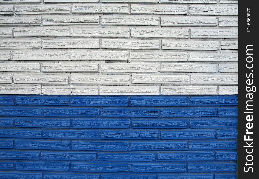 White and blue brick building