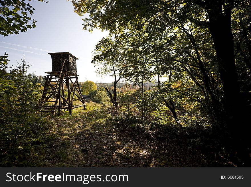 Animal watchpoint in autumn forest while indian summer. Animal watchpoint in autumn forest while indian summer