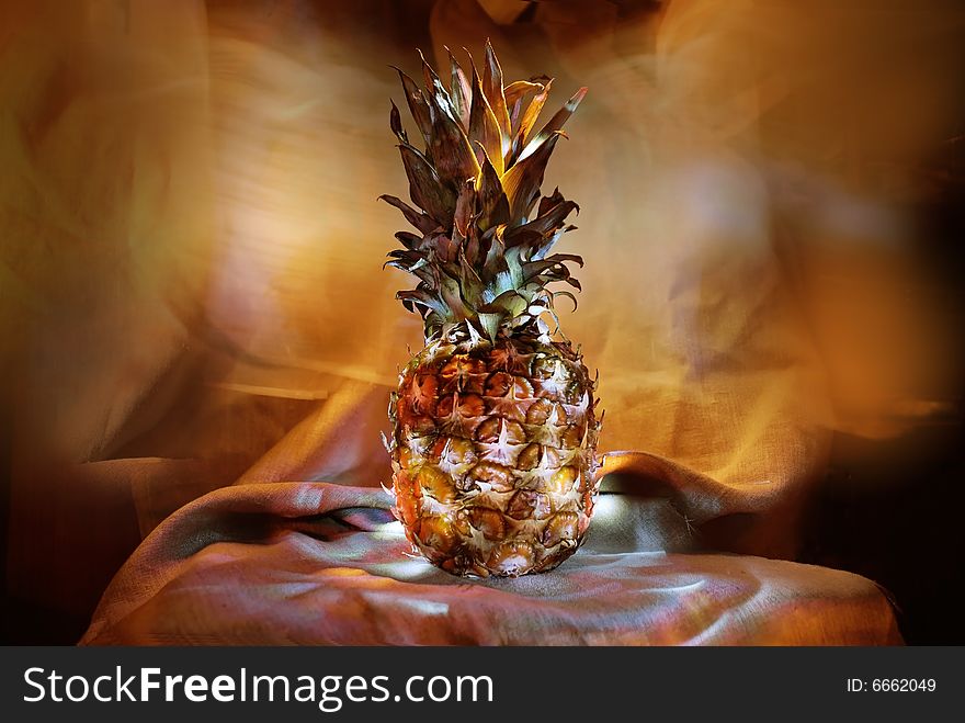 As though luminous in darkness pineapple on a soft background from a canvas. As though luminous in darkness pineapple on a soft background from a canvas