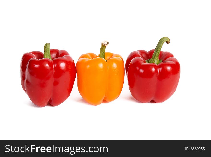 Three red peppers isolated on a white background. Three red peppers isolated on a white background.