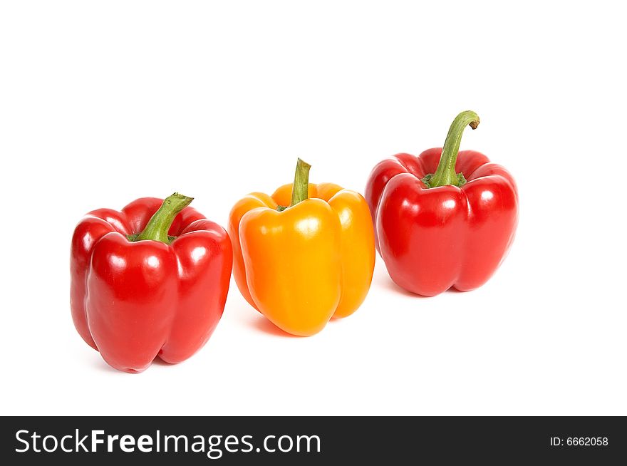 Three red peppers isolated on a white background. Three red peppers isolated on a white background.