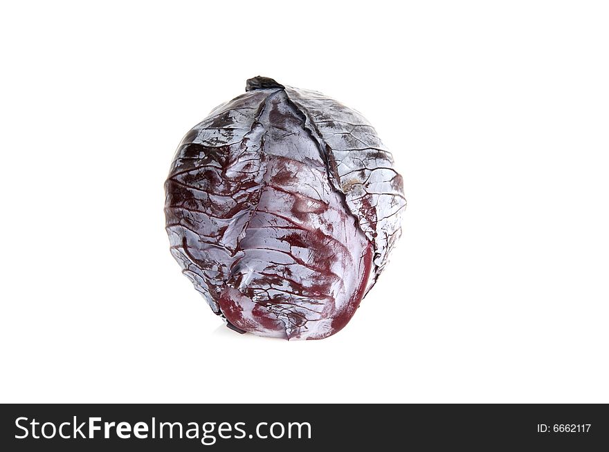 Blue cabbage isolated on a white background. Blue cabbage isolated on a white background.