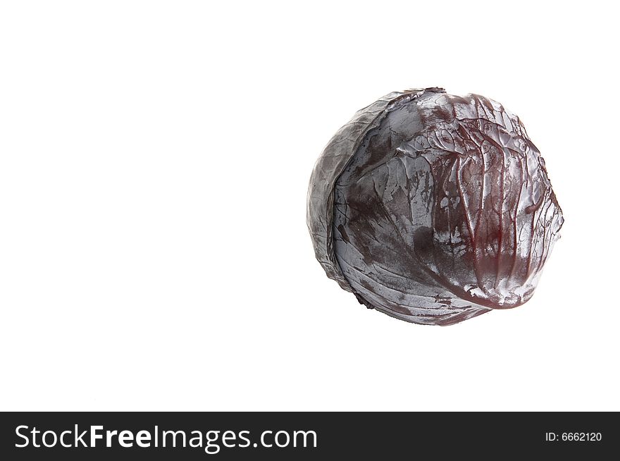 Blue cabbage isolated on a white background. Blue cabbage isolated on a white background.