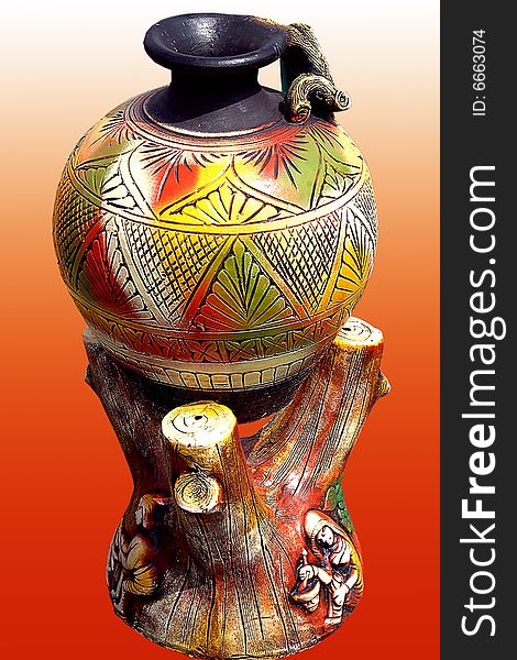 This beautiful, colorful pot is made from clay. This beautiful, colorful pot is made from clay.