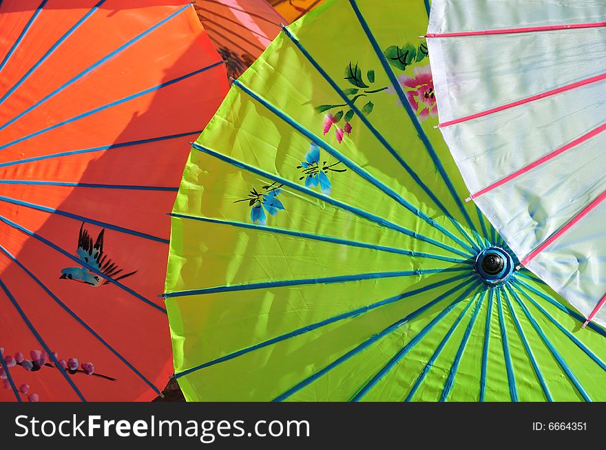 Painted parasols in an outdoor market