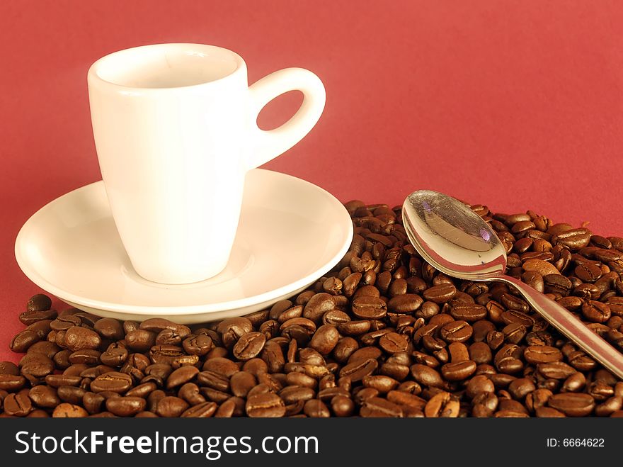 A studio shot series related to coffee - roasted beans with various cups and different backgrounds