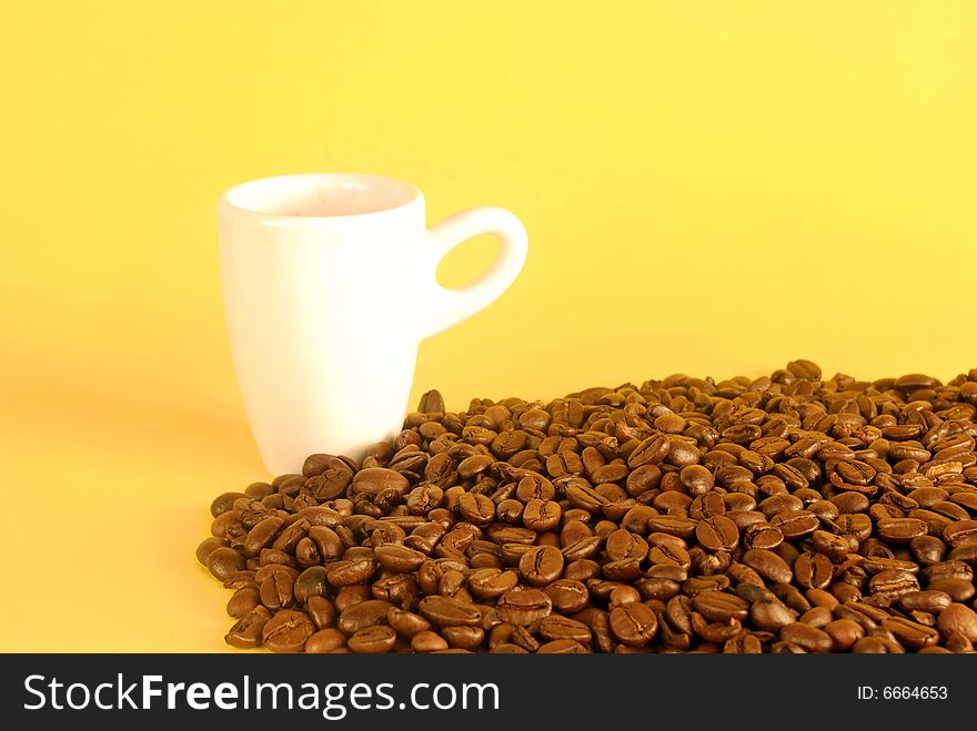 A studio shot series related to coffee - roasted beans with various cups and different backgrounds