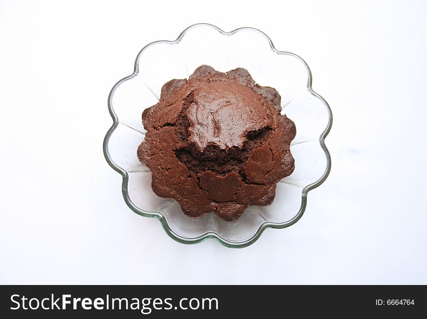 Chocolate cake on a dish shaped flower. Chocolate cake on a dish shaped flower
