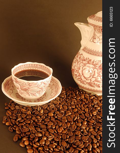A studio shot series related to coffee - roasted beans with various cups and different backgrounds