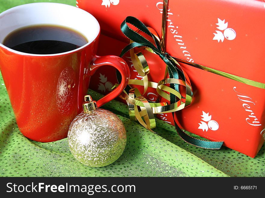 Christmas morning coffee with a gift and decoration. Christmas morning coffee with a gift and decoration
