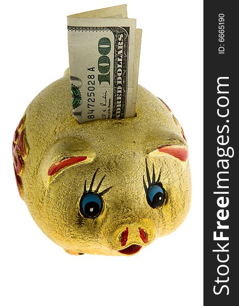 Golden piggy bank with 100 dollar against a white background