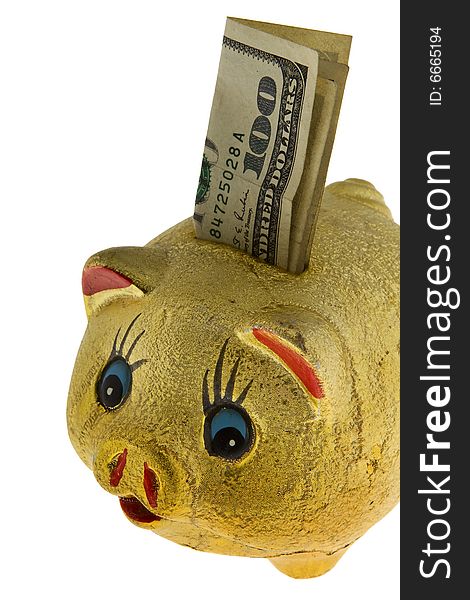 Golden piggy bank with 100 dollar against a white background