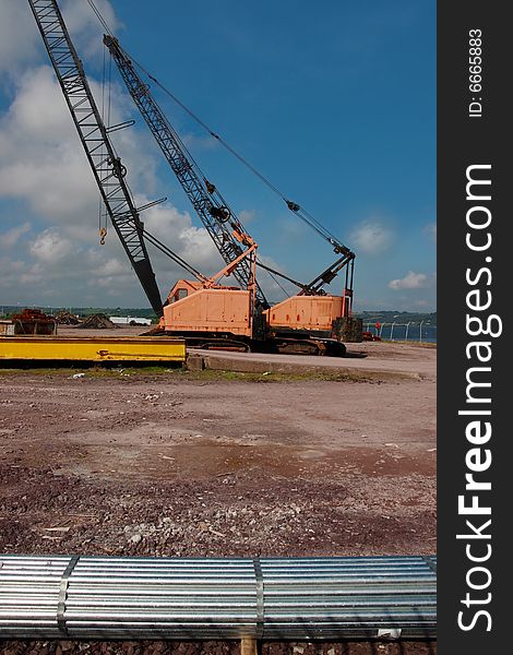 A pair of cranes on an irish quay. A pair of cranes on an irish quay