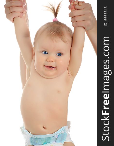 Beautiful baby in a rose plants. Shot in studio. Beautiful baby in a rose plants. Shot in studio.