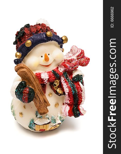 Figurine of a snowman on a white background