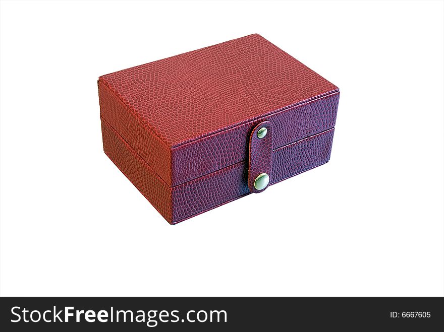 Small womans storage box for trinkets or cosmetics made of snakes skin, with golden latches. Small womans storage box for trinkets or cosmetics made of snakes skin, with golden latches