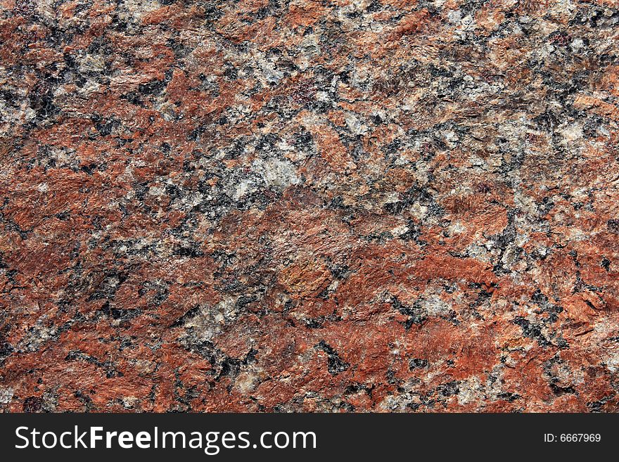 Stone background, granite. Red, white, black and grey color. Stone background, granite. Red, white, black and grey color.