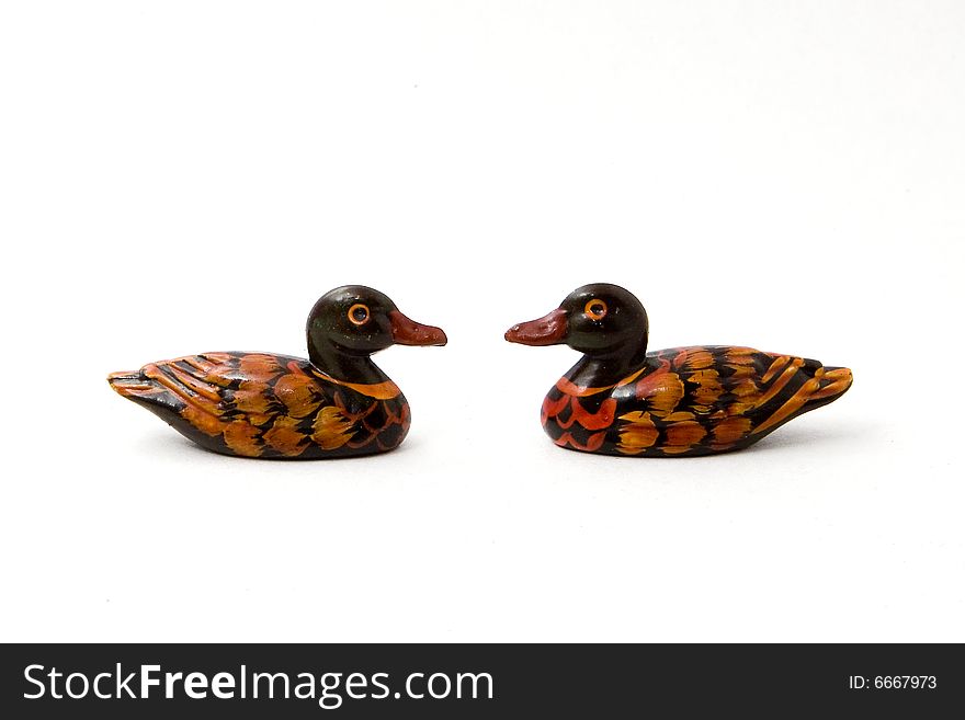 Picture of two wood colored teals for chopsticks. Picture of two wood colored teals for chopsticks