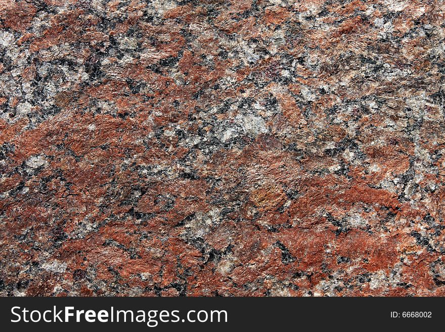 Stone background, granite. Red, white, black and grey color. Stone background, granite. Red, white, black and grey color.