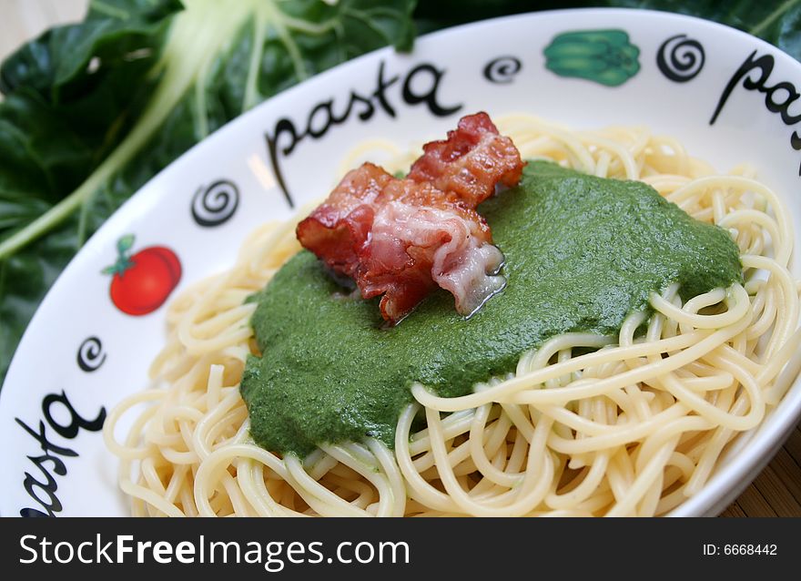 Italian pasta with a sauce of green mangold