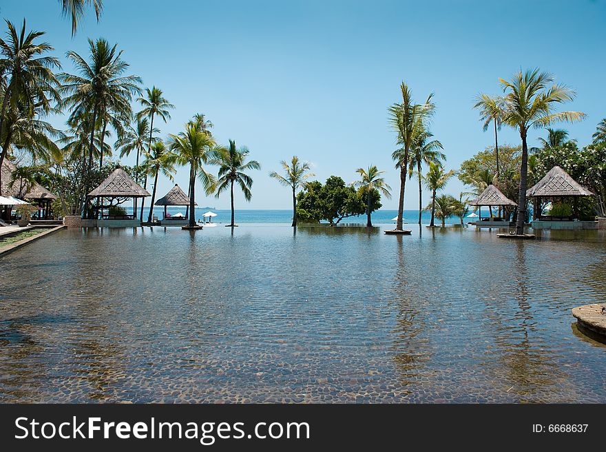 Photo of a beautiful tropical pool near the beach