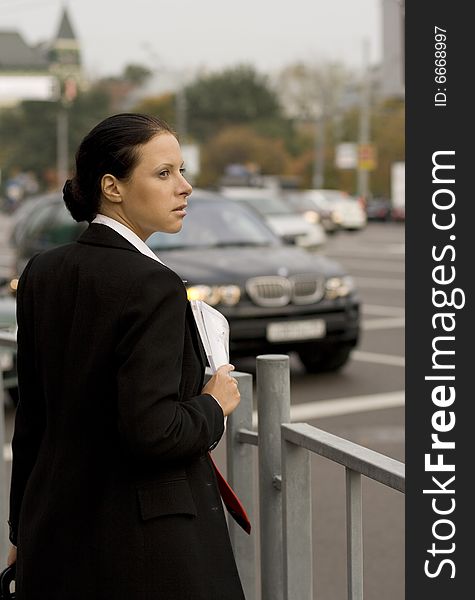 Outdoor portrait of businesswoman in the street