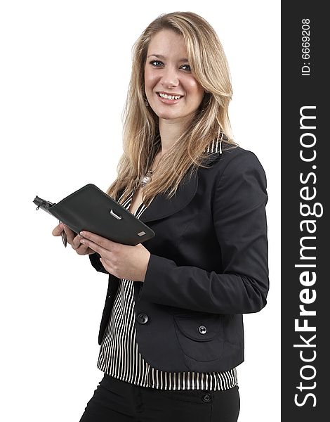 Beautiful blonde businesswoman wearing office clothes holding her diary and a pen. Isolated on white background