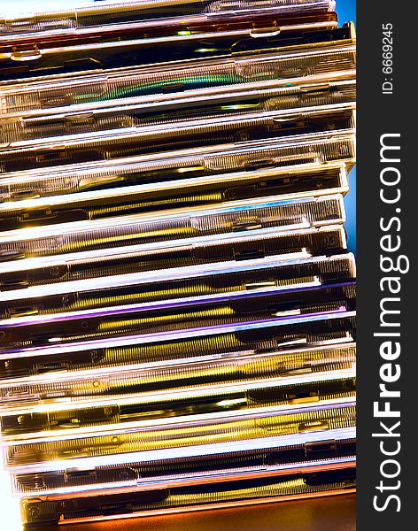Light refractions on a cd-cases stack. Light refractions on a cd-cases stack