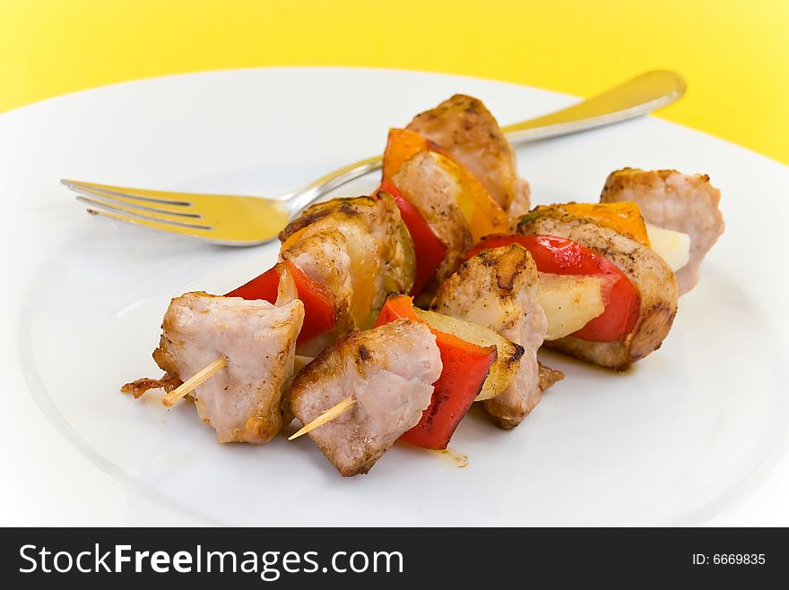 Two Skewer With Onion And Vegetables