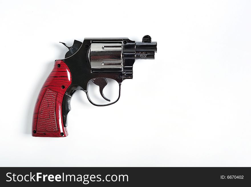 A revolver on simple white background. A revolver on simple white background
