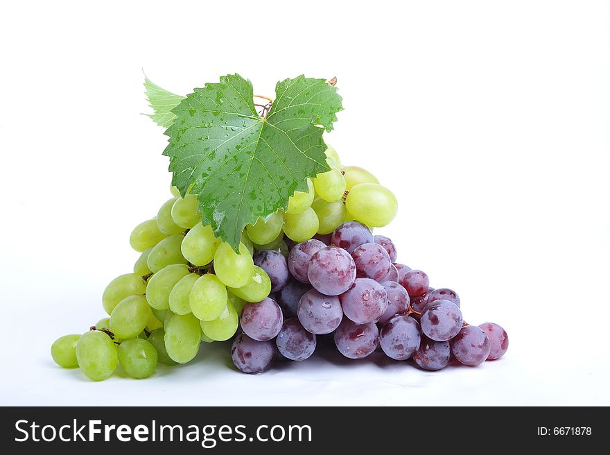 Cluster of grapes on white background - close up