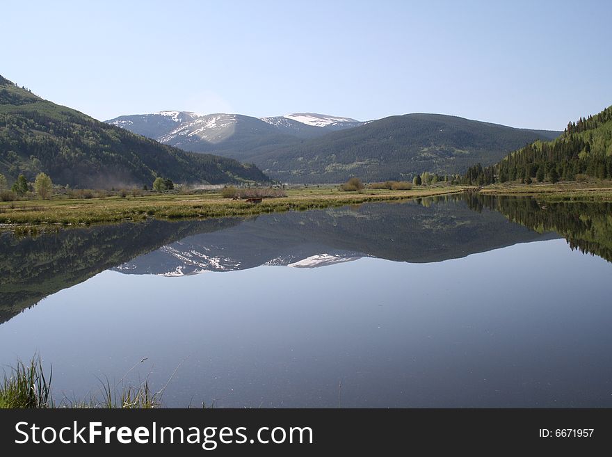 Chicago Ridge in Rocky Mountains Reflected in a Pond at Camp Hale. Chicago Ridge in Rocky Mountains Reflected in a Pond at Camp Hale.