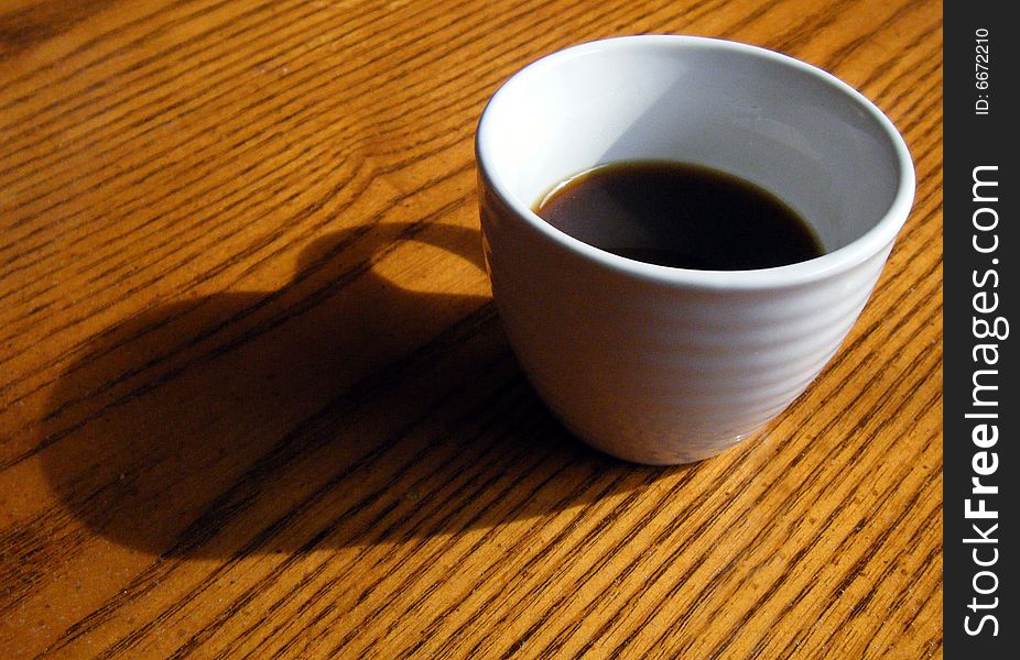 Coffee cup on Wood Table