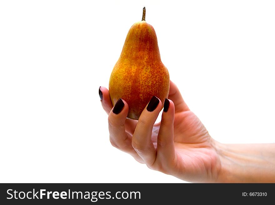 Hand holding pear on white background