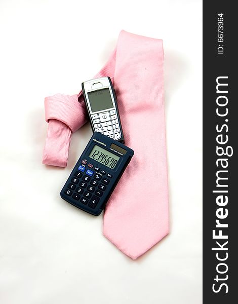 Tie, Calculator And Cell Phone