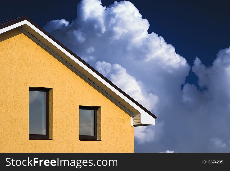 Abstract beautiful house facade under blue sky