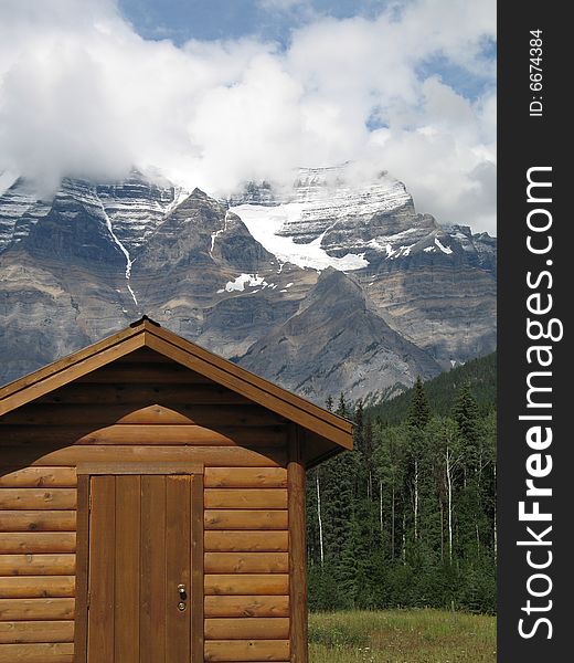 Cottage at the foot of mountains