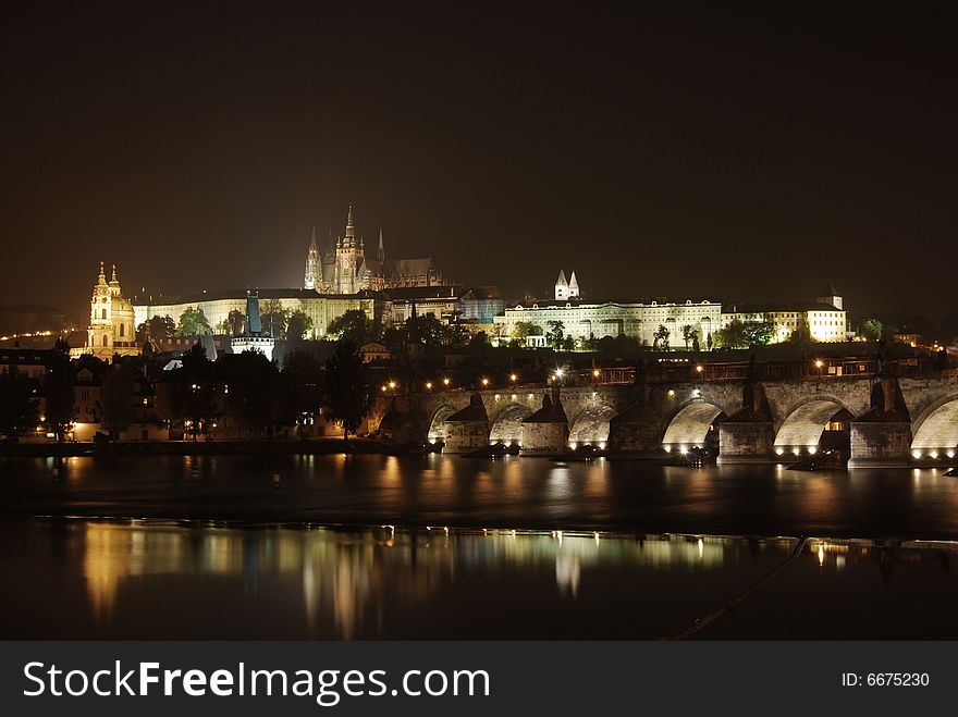 The night sky is lit up with Prague castle and the Charles bridge in the Czech Republic.
. The night sky is lit up with Prague castle and the Charles bridge in the Czech Republic.