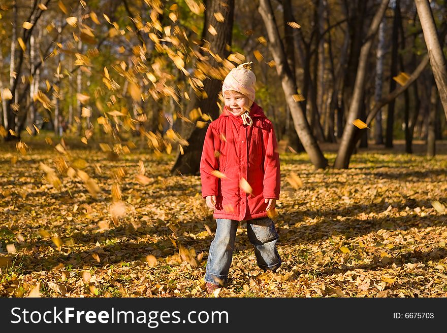 Children Throw Autumn Leaves 2