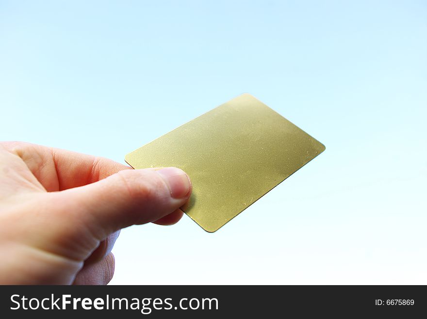 Man hand holding a blank business card