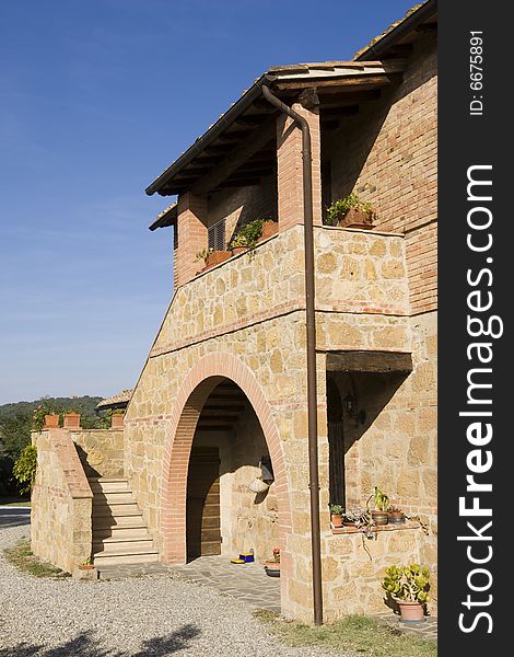 The garden of a luxury country house in the famous Tuscan hills, Italy. The garden of a luxury country house in the famous Tuscan hills, Italy.