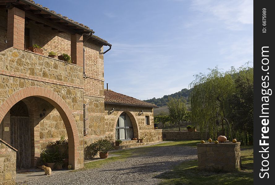 The garden of a luxury country house in the famous Tuscan hills, Italy. The garden of a luxury country house in the famous Tuscan hills, Italy.