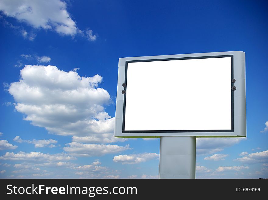 Advertising billboard on sky background